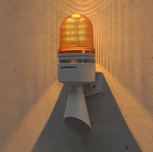 Orange varningslampa på vägg