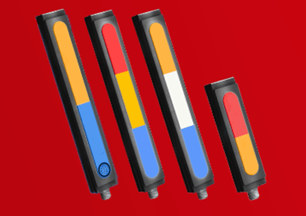 Fyra vertikala ljusindikatorer mot röd bakgrund